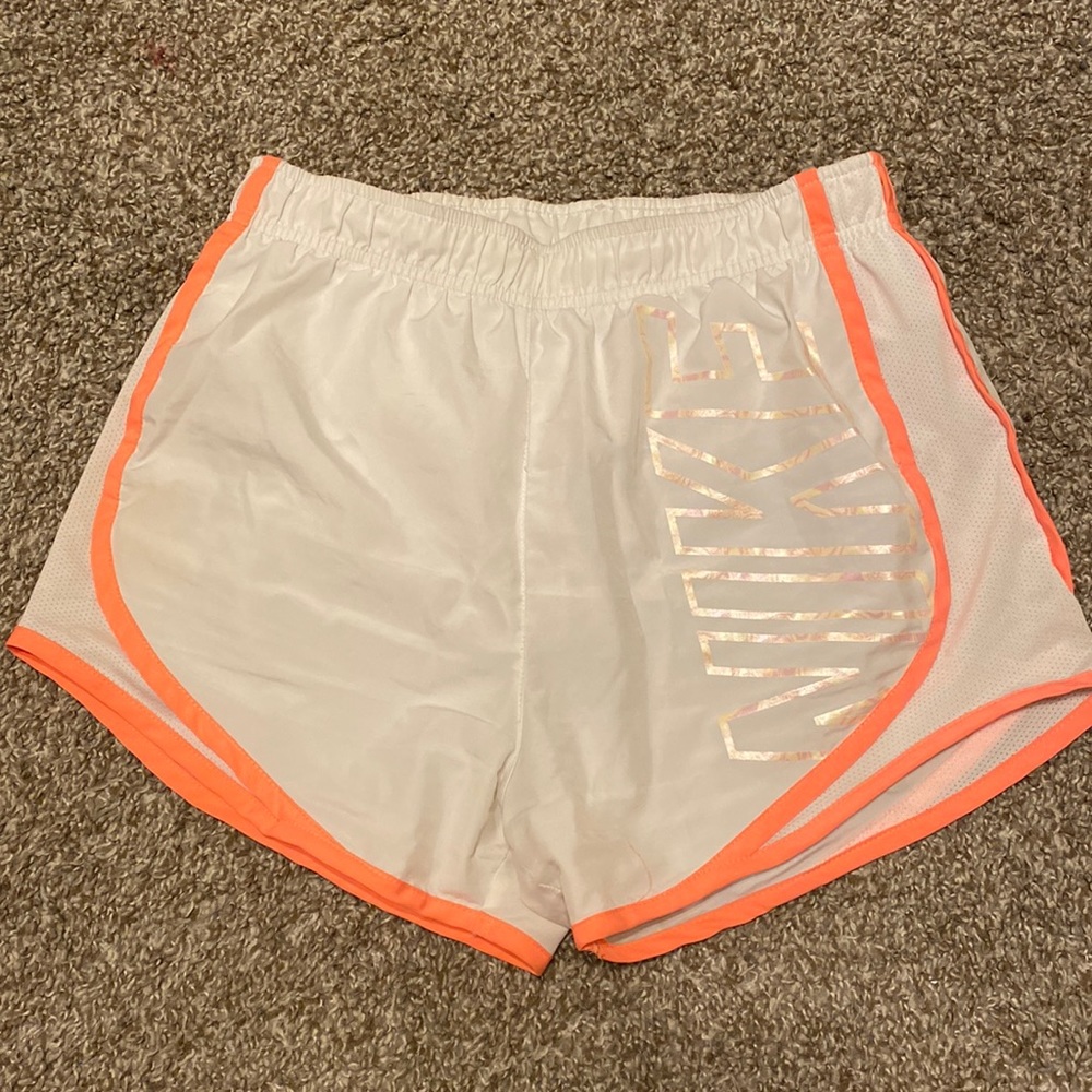 white Nike athletic shorts